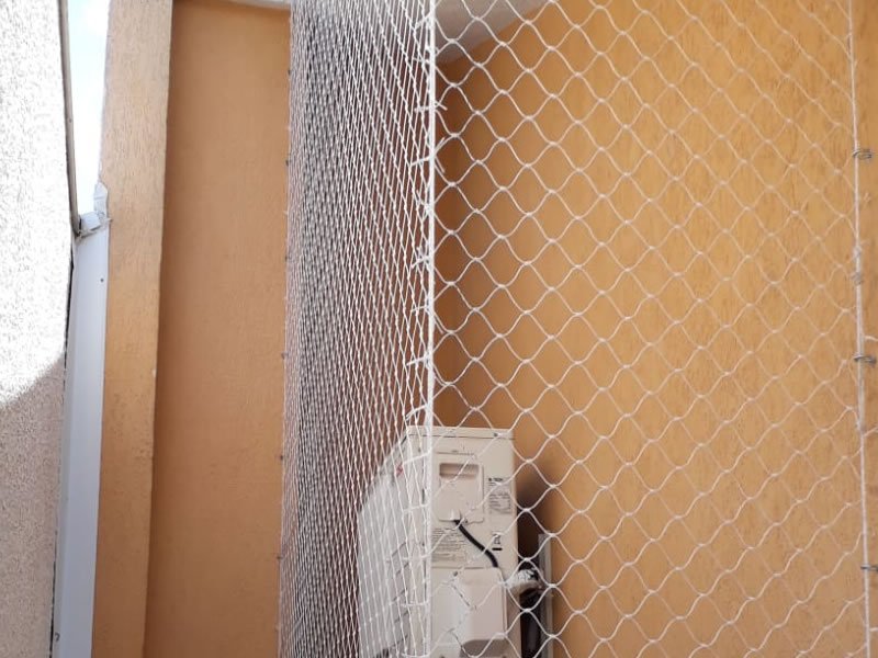 Instalação de rede de proteção em Segismundo Pereira, Uberlândia